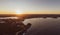 Panoramic aerial drone sunset view of Manly Beach, an affluent seaside suburb of Sydney, New South Wales, Australia.