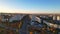 Panoramic aerial drone view of City Gates of Chisinau in Dacia Boulevard. View of road, trees, park, lake, buildings of