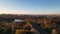 Panoramic aerial drone view of City Gates of Chisinau in Dacia Boulevard. View of road, trees, park, lake, buildings of