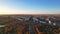 Panoramic aerial drone view of City Gates of Chisinau in Dacia Boulevard. View of road, trees, park, lake, buildings of