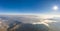 Panoramic aerial drone view of fogs over mountain in Montserrat Barcelona in morning