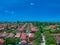 Panoramic Aerial Drone view of Suburban Sydney housing, roof tops, the streets and the parks