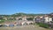 Panoramic aerial drone view of Verona, Italy. Drone approaching the bridge Ponte Pietra and view  of the car traffic by the river.