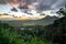 Panoramic aerial image from the Pali Lookout on the island of Oahu in Hawaii. With a bright green rainforest, vertical cliffs and