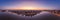 Panoramic aerial shot of Danube Hungarian Parliament and Buda hill at dawn before Budapest sunrise