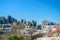 Panoramic aerial top view of mountains stones of El Torcal natural park and a lot of trees on sunny winter