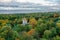 Panoramic aerial view of the Church in the medieval Gothic style in the park of St. Petersburg. Gothic chapel. Autumn