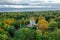 Panoramic aerial view of the Church in the medieval Gothic style in the park of St. Petersburg. Gothic chapel. Autumn