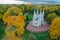 Panoramic aerial view of the Church in the medieval Gothic style in the park of St. Petersburg. Gothic chapel. Autumn