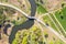 Panoramic aerial view of city park with bike lane and paved pathway