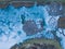 Panoramic aerial view of a frozen lake with animal footprints. Animal tracks on the frozen surface of the lake