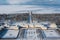Panoramic aerial view of the Grand Palace and the park with fountains in winter in Peterhof. The upper garden is closed for