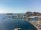 Panoramic aerial view on historical coastal Provencal city La Ciotat with large sailboat harbour and yacht shipyard, summer