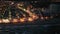 Panoramic aerial view of lighted Oropesa del Mar by Mediterranean coast in twilight, Plana Alta, Spain