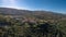 Panoramic aerial view at the Linhares da Beira Castle and Linhares da Beira village downtown, Serra da Estrela mountains on