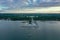 Panoramic aerial view of the Lower Park in Peterhof. Pier. The Gulf of Finland. Summer. Green trees