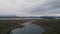 Panoramic Aerial View: Misty Mountains and Lake Prespa, Macedonia, Greece - Creek Flyover
