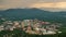 Panoramic aerial view of North Carolina Appalachian city Asheville with downtown architecture and Blue Ridge Mountain