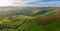 Panoramic Aerial View over Farming Fields at Sunset