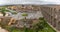 Panoramic aerial view at the Plaza Oriental and Towering Roman aqueduct and grand landmark monument of Segovia