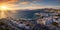 Panoramic aerial view to the beautiful windmills on Mykonos, Greece, during sunset