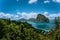 Panoramic aerial view of tropical shoreline on Palawan with epic Pinagbuyutan island on horizon. El Nido-Philippines