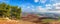 Panoramic agricultural landscape. Plowed land, colorful fields, fish ponds