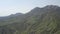 Panoramic air view majestic mountain range. Highlands on hot summer day