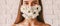 Panoramic banner of happy woman wearing flower medical face mask