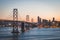 Panoramic beautiful scenic view of the Oakland Bay Bridge and the SF city at dusk, San Francisco, California