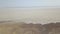 Panoramic beautiful top viewview from above of the Maranjob desert. The drone moves slowly along dried-up salt Lake Namak.