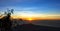 Panoramic beautiful view from top of the volcano Agung at dawn. View of the rising sun and Rinjani mount on the horizon from a