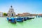 Panoramic beautiful  view of traditional venetian gondolas moored in water of Grand Canal in front of Basilica di Santa Maria