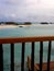 panoramic behind a charming wooden railing fence on the beach, gili lankanfushi maldives