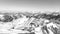 Panoramic black and white view of the swiss Alps in winter