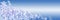 Panoramic blue Christmas background with beautiful snowflakes. Space for text, copy-space