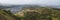 Panoramic breathtaking view from top of Valahnukur mountain on landscape of green valley of Thorsmork with river Krossa