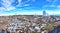 Panoramic of Calar Alto Observatory at the snowy mountain top in Almeria, Andalusia, Spain, 2019. Sky passing through against the