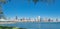 Panoramic Chicago downtown buildings and mature trees in foreground along Michigan Lake