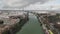 Panoramic cityscape from over Guadalquivir river of Seville, Spain drone