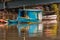 Panoramic colorful view of the city of Paraty, Brazil, near the river, with a fishing boat