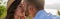 Panoramic concept of bearded man kissing