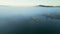 Panoramic drone view of a barge floating in dense fog on the Rhone River in the morning. In the town of Le Pouzin in France