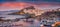 Panoramic evening cityscape of Castelsardo port. Fantastic sunset on Sardinia island, Province of Sassari, Italy, Europe. Fantasti