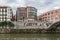 Panoramic exterior view at the Bilbao downtown city, Nervión river and river banks and iconic buildings