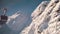 Panoramic Footage Of Two Seat Cable Car On A Ski Track With Snowy Mountains