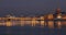 The panoramic footage of the winter night city Saint-Petersburg with picturesque reflection n water, Isaac cathedral on