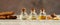 Panoramic header with essential oil bottles with cinnamon and frankincense