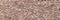 Panoramic high resolution vintage pink, black and red brick wall background texture. Architecture grunge detail abstract theme.