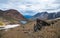 Panoramic highland scenery with sharpened stones of unusual shape. Awesome scenic mountain landscape with big cracked pointed